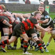 Llandybie feed the ball out from the back of the scrum.