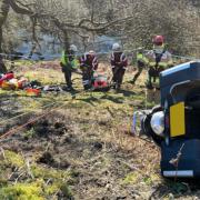 A motorcyclist was rescued by the Mid and West Wales Fire and Rescue Service on a stretcher after driving off a roadway.