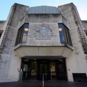 A man appeared at Swansea Crown Court accused of a number of charges against a woman.