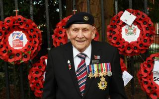 PROUD MOMENT:  100 year old veteran Neville Bowen from Penybanc laid a wreath at the war memorial in Ammanford
